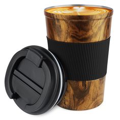 a coffee cup with the lid open next to it