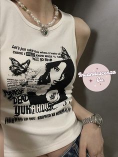 Our Grunge Y2K Tank Top is comfy and eye catching.  This Graphic Tank can be dressed up or down, depending on the occasion or outfit! This Y2K inspired Grunge Tank would make the perfect gift or personal spoil! This tank is a classic basic with a twist! Order yours today to elevate your wardrobe. Thank you for shopping with us!💕 Lots and lots of love Incandescenza Co✨💋  http://incandescenzaco.etsy.com/ ➡️ for more options 💗  -------------- PLEASE CONTACT ME IF YOU HAVE ANY QUESTIONS --------- Trendy Graphic Print Crew Neck Tank Top, Graphic Print Crew Neck Tank Top For Streetwear, Grunge Crew Neck Tank Top With Letter Print, Y2k Cotton Graphic Print Tank Top, Y2k Cotton Tank Top With Graphic Print, Fitted Grunge Tops With Graphic Design, Y2k Style Cotton Crew Neck Tank Top, Y2k Style Crew Neck Cotton Tank Top, Y2k Crew Neck Cotton Tank Top