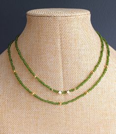 Green beads necklaces Cheap Green Necklaces With Dangling Beads, Cheap Spring Beaded Necklaces With Round Beads, Cute Cheap Green Beaded Necklaces, Cheap Green Necklaces With Letter Beads, Cute Affordable Green Beaded Necklaces, Green White Bead Necklace, Cheap Green Beaded Pendant Necklace, Cheap Green Beaded Necklaces For Spring, Cheap Green Beaded Pendant Necklaces