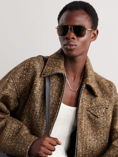 The oversized, angular shape of Bottega Veneta's sunglasses makes them feel really different without straying too far from classic aviator-style frames. They’re made from lightweight black metal and have sleek dark lenses. Gold Aviator Sunglasses, Aviator Style, Sunglasses & Glasses, Aviator Sunglasses, Bottega Veneta, Black Metal, Sunglasses Accessories, Sleek, Fashion News