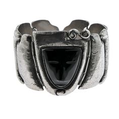 Hallmarks date this Matl bracelet 1934-1940.  Matilde Poulat only used 0.900 silver on her earliest pieces. At front and center is a hand-carved and polished onyx mask, set in a repoussé silver frame with swirls on top and bottom.   This is a very rare and magnificent Matl bracelet.  It measures a closed, wearable length of 6 3/4", with a front width of 1 13/16". Weight is 76.2 grams. Signed and hallmarked with the block mark "MATL 0.900" In excellent original vintage condition with a deep patina.  You can see some of the original tool marks.  Closure is tight and secure. Antique Silver Bracelet With Oxidized Finish For Formal Occasions, Formal Hand-cast Metal Bracelets, Antique Silver Hand-cast Bracelets, Antique Silver Hand Cast Bracelets, Ceremonial Silver Art Deco Jewelry, Antique Polished Bracelet Jewelry, Antique Hand Cast Jewelry For Formal Occasions, Vintage Black Enamel Bracelet Jewelry, Vintage Black Enamel Bracelet