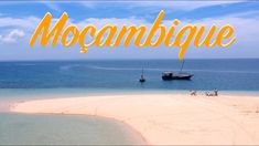 the words mocambique are written over an image of a boat in the ocean