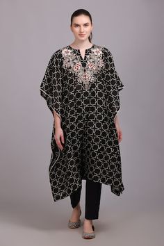 Black geometric printed kaftan with embroidered front, back yoke and laced sleeves border. Paired with a plain straight pant. - Aza Fashions Traditional Tunic Kaftan With Printed Motifs, Traditional Printed Motifs Kaftan Tunic, Traditional Tunic With Kimono Sleeves, Elegant Black Kaftan With Chikankari Embroidery, Traditional Block Print Kaftan For Eid, Black Bohemian Kurta With Intricate Embroidery, Black Tunic Kaftan For Festive Occasions, Black Bohemian Tunic Kurta, Black Bohemian Style Tunic Kurta