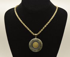 Beautiful vintage carved round piece of labradorite, set with an Italian lira coin from 1996, with 14k yellow gold bail, made in Italy by Milor. The pendant is on an Italian gold tone sterling silver tinsel link chain necklace. Pendant - 2 1/8 x 1 1/2" - 15.9g - Marked "14KT ITALY MILOR" Chain - 18 inches long - 17.5g - Marked "925 ITALY KA 1772" Silver Tinsel, Sterling Necklaces, Chain Link Necklace, Favorite Jewelry, Labradorite, Jewelry Necklace Pendant, Chain Necklace, Jewelry Necklaces, Pendant Necklace