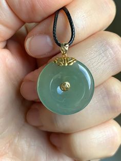 Luxury Round Jade Necklace, Traditional Yellow Gold Jade Jewelry, Formal Round Jade Jewelry, Classic Round Jade Jewelry, Round Emerald Jewelry For Healing, Polished Gold Jade Jewelry, Polished Yellow Gold Jade Jewelry, Luxury Healing Round Jewelry, Yellow Gold Jade Round Jewelry