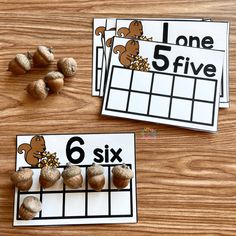 two cards with numbers and nuts on them, one is 5 and the other has six