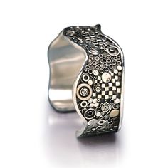 This all sterling silver piece is covered in fun detail. Creating different pattens and visuals that never get old. The undulating shape makes it comfortable for all wrist sizes. It measures 18mm at it's most narrow point and 26mm at it's thickest. Bozeman Mt, Bracelets Silver, Bold Jewelry, Jewelry Studio, Unique Bracelets, Silver Pieces, Silver Cuff, Link Bracelets, Silver Fashion