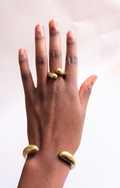 $14 SHIPS ALL ITEMS IN YOUR CART VIA DHL!Handcrafted in Nairobi, Kenya.A beautiful,unique brass cuff that is a must have for all!The cuff is adjustable and is in size Medium - Large.This listing is only for the cuff. ***SHIPPINGExpress shipping (via DHL) takes 2-4 WORKING DAYS to be delivered to you. Modern Brass Cuff Bracelet, Modern Brass Cuff Bracelets, Modern Brass Cuff Bangle, Modern Brass Bangle Cuff Bracelet, Adjustable Brass Cuff Bracelet, Modern Adjustable Brass Bangle, Brass Cuff Bracelet As Gift, Unique Brass Cuff Bracelets, Brass Cuff Bracelet Gift