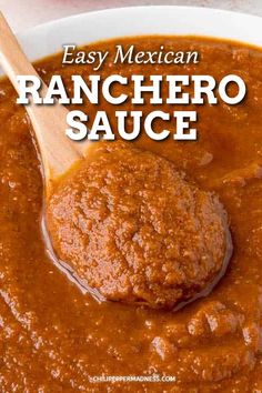 an easy mexican ranchero sauce in a white bowl with a wooden spoon