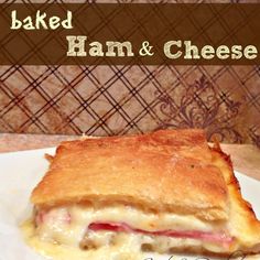 a ham and cheese sandwich on a plate with the words baked ham and cheese over it