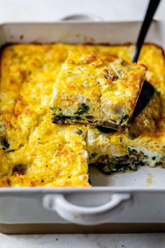 a casserole dish with broccoli and cheese