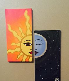 two paintings are hanging on the wall next to each other, one has a sun and moon painted on it