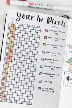 Best Bullet Journal Year at a Glance Ideas for 2024 - Crazy Laura Bullet Journal Year, Journal Year, Bullet Journal Calendrier, Bullet Journal Yearly, Bullet Journal Mood Tracker, Year In Pixels, Goals Bullet Journal