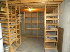 an empty storage room with lots of shelves