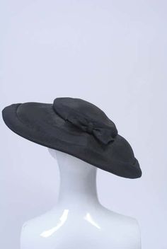 For Sale on 1stDibs - Mr. John, one of America's great milliners, was known for his classic, unembellished shapes, working under his own label from the late 1940s until 1970. Black Boater Hat With Curved Brim For Church, Black Curved Brim Boater Hat For Church, Formal Black Boater Hat With Curved Brim, Classic Felt Hat For Kentucky Derby Evening, Classic Evening Felt Hat For Kentucky Derby, Classic Boater Hat With Short Brim For Evening, Classic Kentucky Derby Evening Felt Hat, Classic Wide Brim Felt Hat For Evening, Classic Wide Brim Hat For Evening