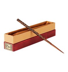 a harry potter's wand in a box