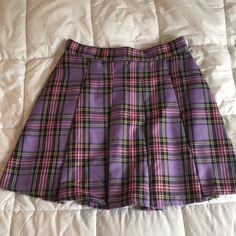 This Skirt Has Pleats In The Front, But None In The Back. Never Worn, No Rips Or Stains. It Is In Great Condition. Purple Lined Mini Tennis Skirt, Purple Pleated Skirted Skort, Casual Purple Mini Pleated Skirt, Purple Pleated Skirt-style Skort, Casual Purple Pleated Lined Skirt, Pleated Purple Skort, Purple Pleated Mini Skirt For School, Fitted Multicolor Mini Skirt For School, Casual Purple Pleated Mini Skirt