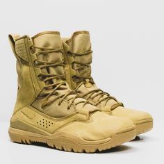 Nike Sfb Field 2 8-Inch Military / Tactical / Combat Boots Color: Desert / Desert Style: Ao7507- 200 The Nike Sfb Field 2 8” Is A Lightweight High-Performance Boot Designed To Support Heavier Loads In All Theaters. The Sole Is Equipped With An Aggressive Tread Pattern That Provides Exceptional Traction Over Challenging Terrain, While An Internal Rock Shield Helps Prevent Punctures. Synthetic Leather And Nylon Canvas Provide Durability And Breathability. Dual-Zone Lacing Nike Lace-up Combat Boots For Outdoor, Combat Boots With Vibram Sole For Outdoor Activities, Combat Boots With Vibram Sole For Sports, Combat Boots Abrasion-resistant For Sports, Tactical Lace-up Desert Boots For Outdoor Work, Khaki Tactical Boots For Outdoor Work, Nike Leather Hiking Boots Functional, Combat Hiking Boots With Vibram Sole, Tactical Khaki Combat Boots For Hiking