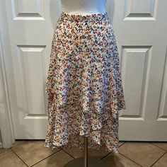 Size Medium Nwt Sans Souci Floral Tiered Hi-Low Skirt Beautiful Addition To Your Summer Wardrobe! Light And Flowy! Unlined Zips In The Back See Pics For Measurements. Comes From A Smoke Free Home. Thanks For Stopping By! Spring High-low Hem Flowy Skirt, Bohemian High-low Hem Flowy Maxi Skirt, Red Non-stretch Bohemian Skirt, Hi Low Skirts, Wrap Maxi Skirt, Sans Souci, Mid Length Skirts, Boho Floral, Red Fashion