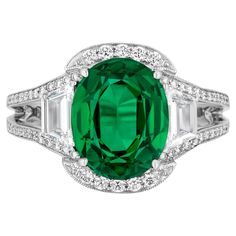 Designed and created by Sophia D., this ring in platinum setting features a round emerald that weighs 3.69 carats and is accentuated with 0.54 carats and 0.25 carats of diamonds. Sophia D by Joseph Dardashti LTD has been known worldwide for 35 years and are inspired by classic Art Deco design that merges with modern manufacturing techniques. Green Halo Ring With Round Cut For Formal Occasions, Green Platinum Halo Ring With Center Stone, Green Oval Emerald Ring In Platinum, Formal Green Platinum Diamond Ring, Gia Certified Green Platinum Halo Ring, Green Platinum Ring With Round Cut, Green Platinum Halo Ring, Formal Gia Certified Green Halo Ring, Formal Tsavorite Emerald Ring With Round Cut