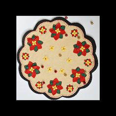 a round rug with bows and bells on it