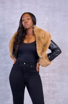 FEATURES Long sleeved Faux fur collar and trimming Cropped CONTENT & CARE Polyurethane/Polyester/Cotton Dry clean DEETS & FIT Model is wearing a size Medium Fabric has no stretch Model profile: Uche is 5'9" and measures 34 (bust) 27 (waist) and 45 (hips) Winter Faux Leather Outerwear With Faux Fur Trim, Fitted Faux Leather Winter Outerwear, Fitted Faux Leather Outerwear For Winter, Chic Faux Fur Leather Jacket With Trim, Trendy Faux Fur Leather Jacket For Fall, Faux Fur Lined Leather Jacket For Fall, Trendy Faux Leather Outerwear With Faux Fur Trim, Trendy Faux Leather Jacket With Faux Fur Trim, Cold Weather Faux Leather Outerwear With Faux Fur Trim