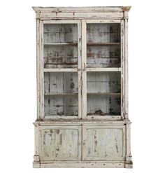 an old white china cabinet with glass doors and drawers on the bottom, against a white background