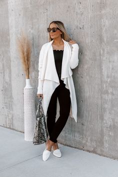 Our "Everyday Style" oversized cardigan jacket is so cozy and cool! This classic cream pocketed cardigan features an open front and long sleeves. Throw this piece on with the "Lamar" tank bodysuit and the "Liam" denim black jeggings! Oversized Jacket Model is 5"7 in a size small Fall Outerwear Pieces Cream Knit Cardigan Open Front Pockets Colors May Vary Patterns May Vary Winter White Long Sleeve Loungewear Cardigan, White Long Sleeve Cardigan For Loungewear, Versatile Outerwear For Winter Day Out, Versatile Winter Outerwear For Day Out, Chic Cream Sweater Coat For Layering, White Outerwear For Layering In Fall, Versatile Long Sleeve Outerwear For Day Out, Chic Long Sleeve Sweater Coat For Everyday, White Long Sleeve Sweater Coat For Loungewear