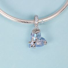 This is charm only, bracelet is sold separately. This elegant sea theme pendant charm for bracelet, necklace features a beautiful blue heart crystal with starfish, seashell motif decoration, made of solid 925 sterling silver and high quality crystal. Add a touch of beachy bliss to your jewelry collection with this stunning sea-themed pendant charm! Made of high-quality 925 sterling silver, this charm showcases a vivid blue heart crystal embellished with delicate starfish and seashell designs. It Star-shaped Sterling Silver Jewelry With Lobster Clasp, Ocean-inspired Sterling Silver Jewelry With Starfish Charm, Ocean-inspired Blue Jewelry With Star Charm, Ocean-inspired Silver Charms Jewelry, Silver Starfish Charm For Gifts, Silver Starfish Charm As Gift, Silver Starfish Charm For Gift, Sterling Silver Ocean-inspired Jewelry With Star Charm, Ocean-inspired Sterling Silver Star Charm Jewelry