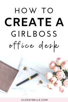 a desk with flowers, pen and notebook on it that says how to create a girlboss office desk