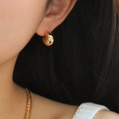 Gold earrings in a crescent shape When the crescent moon is covered with gold, the gold earrings are the most dramatic jewels in the world. As if blessed by Luna, the crescent moon earrings represent plump grapes, representing the joy of harvest. Bold and timeless gold crescent moon earrings are the perfect medium to show personal taste and express individual confidence. Chunky gold hoop earrings are available in gold and silver These chunky gold hoop earrings are made of brass and 18k gold plat Minimalist Crescent Hoop Earrings, Moon Charm Huggie Earrings, Gold Crescent Hoop Earrings For Everyday, Gold Half Moon Hoop Earrings With Moon Charm, Everyday Gold Crescent Hoop Earrings, Tarnish Resistant Crescent Hoop Earrings, Yellow Gold Crescent Hoop Earrings, Gold Hoop Earrings With Moon Charm, Gold Plated Crescent Hoop Earrings