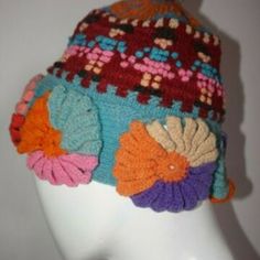 Peruvian Chullo Women's Hat Made Of Multicolored Bee Wool. This Hat Is Used To Protect Oneself From The Intense Cold In The High Andean Areas. It Originates From The Andean Region Of Peru. It Can Also Be Seen In The Images. It Has Multicolored Flower Designs, Handmade By The Peruvian Artisans Andean Community Cusco Womens Newsboy Cap, Free People Hat, Plaid Bucket Hat, Pom Pom Beanie Hat, Rancher Hat, Wedding Tea, Red Fleece, Western Hats, Derby Hats