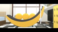 an animated image of a banana hanging from a rope in a room with yellow balls on the floor