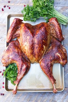 a whole chicken sitting on top of a tray