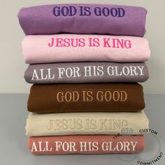 four folded towels with the words jesus is king and all for his glory