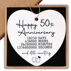 a 50th anniversary ornament in a gift box