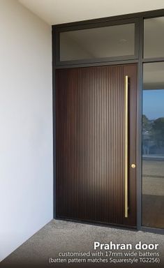 an empty room with sliding glass doors and carpeted flooring