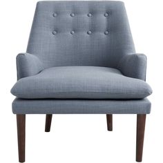 an upholstered blue chair with buttons on the armrests and wood legs