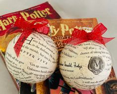 harry potter and the deathly hall ornament with red ribbon on it's head