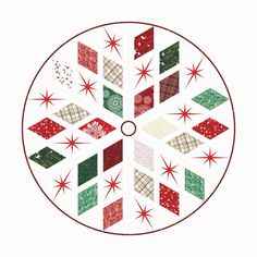 a quilted christmas ornament with red, green and white stars on it