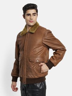 The Brown Bomber Leather Jacket is the perfect combination of style and comfort. Crafted from genuine lambskin leather and featuring a Sherpa fur lining, this jacket is as timeless as it is cozy. With its distress & bombardier look, center zip fastening, and multiple zipped pockets, you'll look and feel great in any situation. Color- Distress brown Nickel finish YKK hardware Sherpa fur lining in the full body Two Inside Pockets Handcrafted Jacket Fit: Bomber Regular Used Materials Shell: Genuine Leather Artist, Jacket Store, Blue Leather Jacket, Fur Leather Jacket, Rugged Look, Crisp White Shirt, Modern Gentleman, Fur Fashion, Brown Leather Jacket