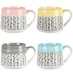 three different colored coffee mugs sitting next to each other