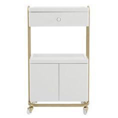 a white and gold metal shelf with two drawers on wheels, against a white background