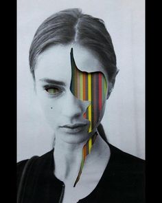 a woman's face is painted with multicolored lines