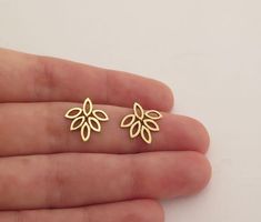 Solid 14k gold leaf stud earrings.These dainty marquise shaped leaves studs, remind me of the lotus blossom. They drop just a little below the earlobe and are beautiful and and elegant, lightweight and comfortable to wear. Get them as a gift for your wife or girlfriend, or as gift for yourself! The earrings measures: 1.4 by 1.5 cm/ 0.5 by 0.6 inch, and have a shiny finish.I also make these earrings in sterling silver:https://www.etsy.com/listing/189038161And as dangle gold earrings with Blue Top Gold Cluster Earrings In Sterling Silver As A Gift, Gold Sterling Silver Cluster Earrings As Gift, Gold Cluster Earrings Gift, Fine Jewelry, Gold Sterling Silver Cluster Earrings For Gifts, Gold Cluster Earrings Fine Jewelry For Gift, Dainty Gold Cluster Earrings With Matching Set, Hypoallergenic Gold Cluster Earrings As Gift, Dainty Gold Cluster Earrings As A Gift, Gold Cluster Earrings In 14k Gold