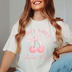 Indulge in the spirit of femininity and fun with our Girly Girls Social Club Comfort Color Tee. Designed for those who embrace their girly side with pride, this tee is a celebration of all things pink, sparkly, and fabulous. Featuring a charming design with the words "Girly Girls Social Club" adorned in stylish lettering, this tee is a playful addition to any wardrobe. Made with premium Comfort Color fabric, it offers unmatched softness and durability, ensuring comfort all day long. Whether you' School Club Shirts, Girls Squad, Sweater Hat, Pink Sparkly, Trendy Graphic Tees, Los Angeles Style, Club Shirts, Comfort Colors Tee, Comfort Color