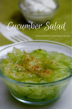 cucumber salad in a glass bowl on a table