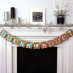 a banner that says buck or doe hanging from a fireplace mantel above a mantle