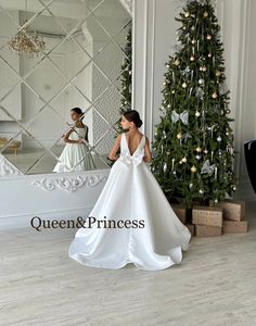 Elegant Princess Ball Gown For Wedding, Elegant Satin Princess Dress For Wedding, Elegant Ball Gown For First Communion Party, Fitted Bodice Ball Gown For Confirmation, Elegant Sleeveless Pageant Dress For Wedding, Elegant Sleeveless Wedding Pageant Dress, Princess Ball Gown For Confirmation, Elegant Princess Dress For Baptism With Fitted Bodice, Princess Style Satin First Communion Dress