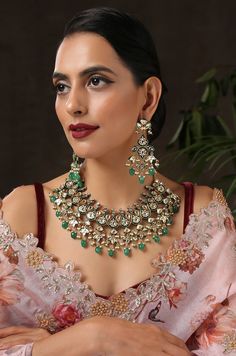 This necklace set is our sincere attempt to render the ethereal beauty of a peacock a visual expression. Embodying the elegance, suave and enchanting beauty of the peacock, the king of birds, this necklace is truly a masterpiece. Necklace Closure - Adjustable Dori Earrings Closure - Push Back Necklace -20 inches Earrings - 3.25 inches Style Tip - These tasteful designs with oodles of luxurious details will keep you hooked every time you look at them. The mesmerizing play of light and textures ar Green Meenakari Necklace For Formal Occasions, Green Meenakari Necklace For Parties, Elegant Green Necklace With Meenakari, Traditional Green Meenakari Beaded Necklace, Festive Green Meenakari Choker, Meenakari Necklace, Necklace Closure, Peacock Necklace, America Flag